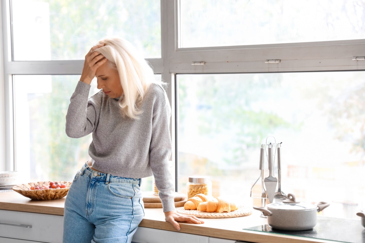 Stressed middle-aged woman