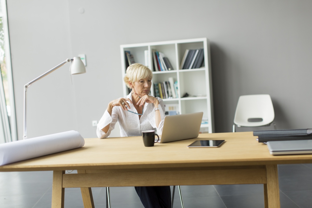 Middle-aged woman working in an office